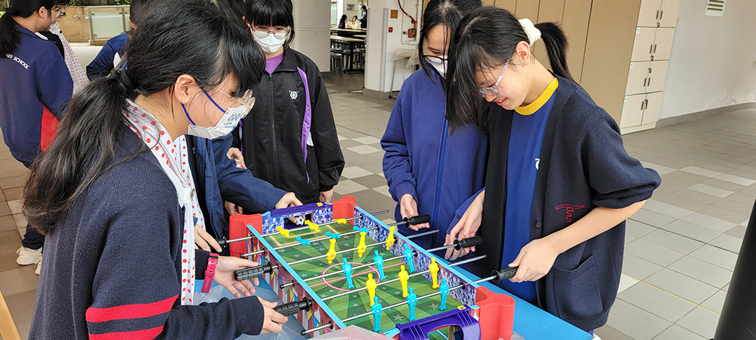 A person standing in front of a classroomDescription automatically generated